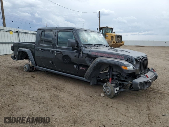 2023 Jeep Gladiator Rubicon with VIN 1C6JJTBG7PL573197, listed as a Copart auction lot 53866075 with 19,521 mi miles and Salvage title. Bid and sale history available at DreamBid. Image 4.