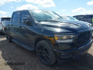 2023 Ram 1500 Laramie with VIN 1C6SRFJT6PN542105, listed as a IAAI auction lot 41974428 with 74,489 mi miles and . Bid and sale history available at DreamBid. Image 1.