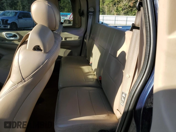 2002 Ford F-150 XL with VIN 1FTRX17L72NA39909, listed as a Copart auction lot 76376994 with 175,926 mi miles and Salvage title. Bid and sale history available at DreamBid. Image 10.