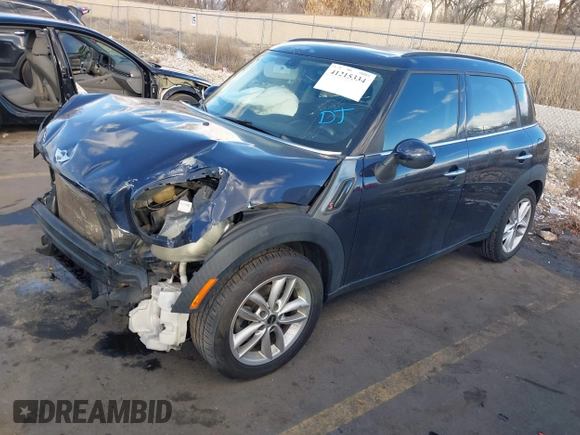 2013 MINI Countryman S with VIN WMWZC3C52DWP21475, listed as a IAAI auction lot 41215334 with 124,365 mi miles and . Bid and sale history available at DreamBid. Image 18.
