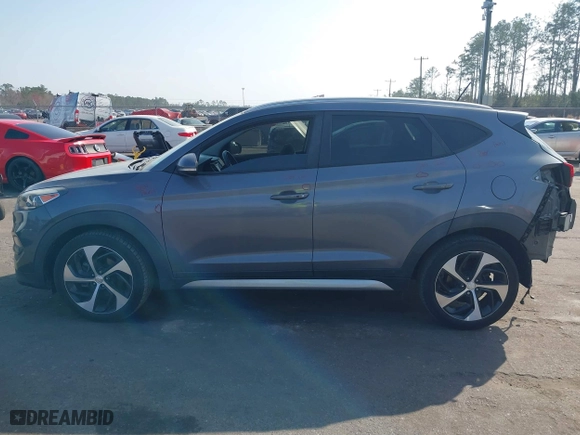 2017 Hyundai Tucson Value with VIN KM8J33A24HU281183, listed as a IAAI auction lot 41563886 with 71,110 mi miles. Bid and sale history available at carsss.com. Image 14.