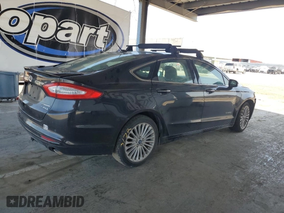 2014 Ford Fusion Titanium Hybrid with VIN 3FA6P0RUXER363916, listed as a Copart auction lot 62224315 with 126,308 mi miles and Salvage title. Bid and sale history available at DreamBid. Image 3.
