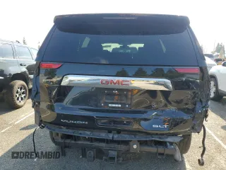 2021 GMC Yukon SLT with VIN 1GKS1BKD0MR395515, listed as a Copart auction lot 42810935 with 54,071 mi miles and Salvage Title. Bid and sale history available at carsss.com. Image 6.