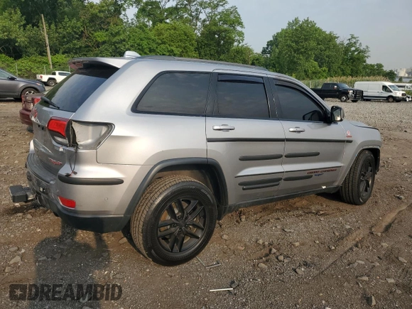 2017 Jeep Grand Cherokee Trailhawk with VIN 1C4RJFLTXHC700177, listed as a Copart auction lot 60660645 with Not provided miles and Salvage title. Bid and sale history available at DreamBid. Image 3.