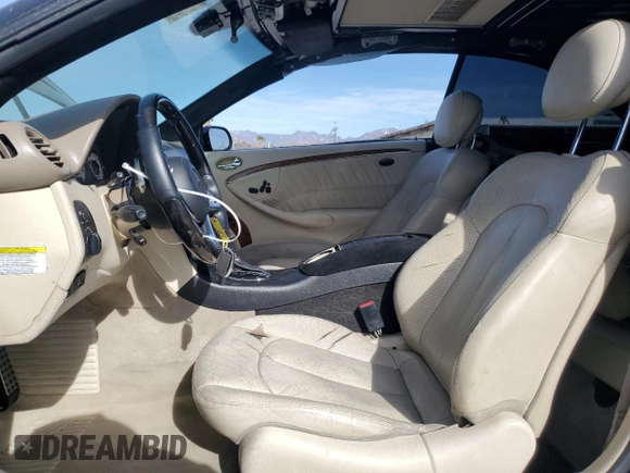 2009 Mercedes-Benz CLK 550 with VIN WDBTJ72H69F266105, listed as a Copart auction lot 79723224 with 114,840 mi miles and Salvage Title. Bid and sale history available at DreamBid. Image 7.