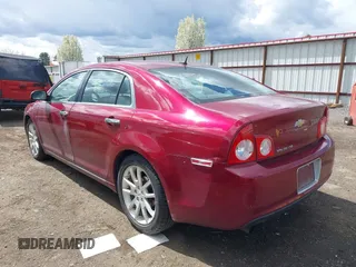 2011 Chevrolet Malibu LTZ with VIN 1G1ZE5E1XBF119559, listed as a IAAI auction lot 42095401 with 145,157 mi miles and . Bid and sale history available at DreamBid. Image 3.