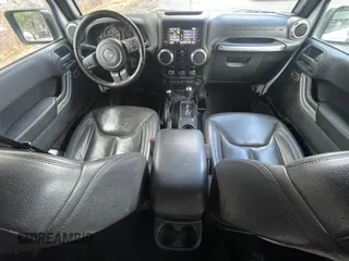 2016 Jeep Wrangler Unlimited 75th Anniversary with VIN 1C4BJWEG5GL215915, listed as a Copart auction lot 52680895 with 143,836 mi miles and Clean title. Bid and sale history available at DreamBid. Image 9.