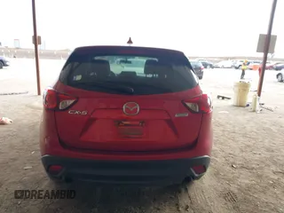 2016 Mazda CX-5 Touring with VIN JM3KE2CY0G0691927, listed as a IAAI auction lot 41611743 with 160,246 mi miles. Bid and sale history available at carsss.com. Image 16.
