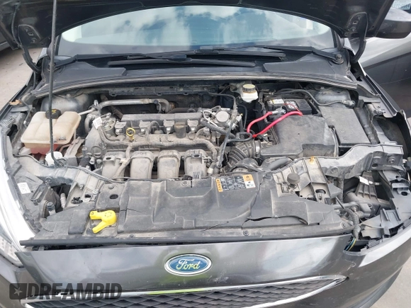 2018 Ford Focus SE with VIN 1FADP3F22JL295342, listed as a IAAI auction lot 42335881 with 77,464 mi miles and . Bid and sale history available at DreamBid. Image 10.