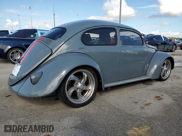 1965 Volkswagen Beetle with VIN 115467066, listed as a Copart auction lot 74195744 with Not Provided miles and Salvage Title. Bid and sale history available at DreamBid. Image 3.