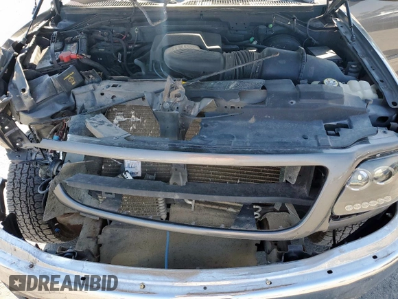 2002 Ford F-150 XL with VIN 1FTPX18L32NB65156, listed as a Copart auction lot 61418955 with 176,622 mi miles and Salvage title. Bid and sale history available at DreamBid. Image 11.