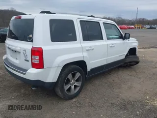 2016 Jeep Patriot High Altitude Edition with VIN 1C4NJRFB3GD753248, listed as a IAAI auction lot 42005423 with 165,229 mi miles. Bid and sale history available at carsss.com. Image 4.