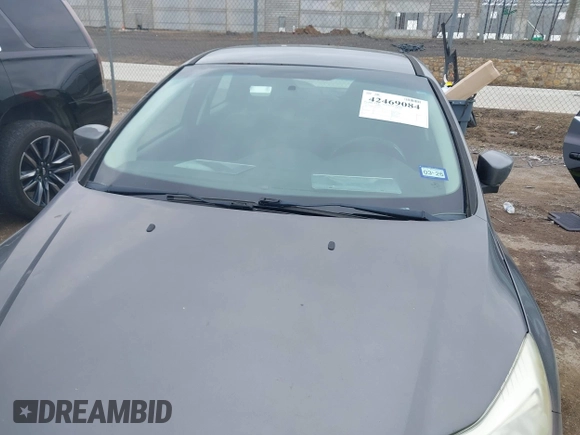 2012 Ford Focus SE z VIN 1FAHP3F2XCL430734, wystawiony jako IAAI lot #42469084 z przebiegiem 128 168 mil mil oraz . Historia ofert i sprzedaży dostępna na DreamBid. Obrazek 6.
