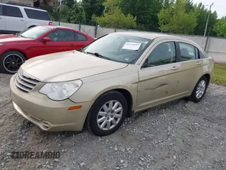 2010 Chrysler Sebring Touring z VIN 1C3CC4FBXAN210425, wystawiony jako IAAI lot #42275197 z przebiegiem 123 200 mil mil oraz . Historia ofert i sprzedaży dostępna na DreamBid. Obrazek 2.