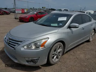 2015 Nissan Altima S with VIN 1N4AL3AP4FC581542, listed as a IAAI auction lot 42144435 with 147,698 mi miles and . Bid and sale history available at DreamBid. Image 2.