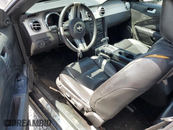 2007 Ford Mustang Deluxe z VIN 1ZVHT84N775320604, wystawiony jako Copart lot #55970295 z przebiegiem 164 642 mil mil oraz Szkoda całkowita • Salvage title. Historia ofert i sprzedaży dostępna na DreamBid. Obrazek 8.
