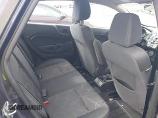 2013 Ford Fiesta SE z VIN 3FADP4BJ3DM142247, wystawiony jako IAAI lot #42337359 z przebiegiem 149 711 mil mil oraz . Historia ofert i sprzedaży dostępna na DreamBid. Obrazek 8.