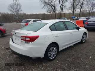 2021 Subaru Impreza with VIN 4S3GKAB61M3605939, listed as a IAAI auction lot 41125198 with 42,168 mi miles. Bid and sale history available at carsss.com. Image 4.