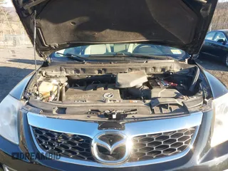 2010 Mazda CX-9 Touring with VIN JM3TB3MV9A0205825, listed as a IAAI auction lot 41040715 with 158,058 mi miles and . Bid and sale history available at DreamBid. Image 10.