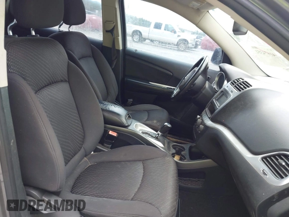 2013 Dodge Journey SE z VIN 3C4PDCAB2DT577805, wystawiony jako IAAI lot #41674351 z przebiegiem 183 006 mil mil oraz . Historia ofert i sprzedaży dostępna na DreamBid. Obrazek 5.