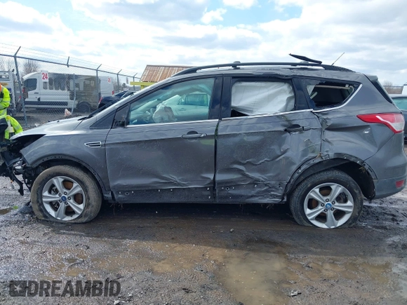 2013 Ford Escape SE with VIN 1FMCU9GX6DUA83081, listed as a IAAI auction lot 41991167 with 106,793 mi miles and . Bid and sale history available at DreamBid. Image 15.