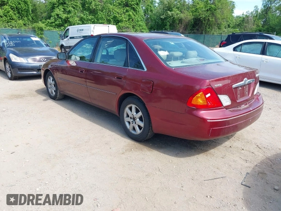 2001 Toyota Avalon XL z VIN 4T1BF28B61U144974, wystawiony jako IAAI lot #42112377 z przebiegiem 168 311 mil mil oraz . Historia ofert i sprzedaży dostępna na DreamBid. Obrazek 3.