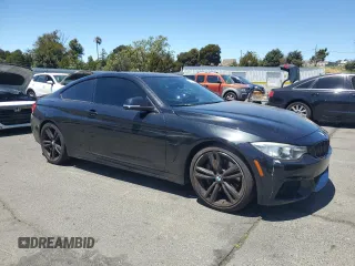 2014 BMW 4 Series 435i with VIN WBA3R1C5XEK192441, listed as a Copart auction lot 65279455 with 145,068 mi miles and Salvage title. Bid and sale history available at DreamBid. Image 4.