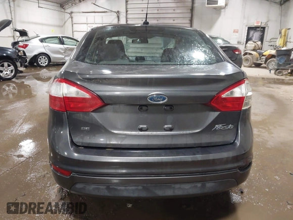 2015 Ford Fiesta SE with VIN 3FADP4BJ9FM164093, listed as a IAAI auction lot 41308905 with 75,839 mi miles. Bid and sale history available at carsss.com. Image 16.