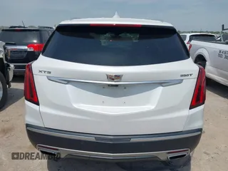 2021 Cadillac XT5 FWD Premium Luxury z VIN 1GYKNCR42MZ174309, wystawiony jako IAAI lot #42051341 z przebiegiem 75 544 mil mil oraz . Historia ofert i sprzedaży dostępna na DreamBid. Obrazek 16.