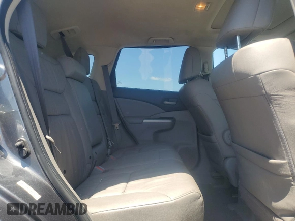 2013 Honda CR-V EX-L z VIN 2HKRM4H7XDH628094, wystawiony jako Copart lot #57358245 z przebiegiem 123 505 mil mil oraz Szkody całkowita. Historia ofert i sprzedaży dostępna na DreamBid. Obrazek 11.