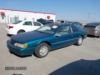 1992 Ford Thunderbird with VIN 1FAPP6049NH155435, listed as a IAAI auction lot 41995083 with 152,615 mi miles and . Bid and sale history available at DreamBid. Image 2.