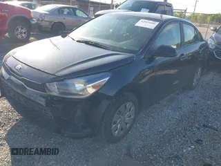 2020 Kia Rio LX with VIN 3KPA24AD6LE309894, listed as a IAAI auction lot 42019106 with 64,851 mi miles and . Bid and sale history available at DreamBid. Image 2.