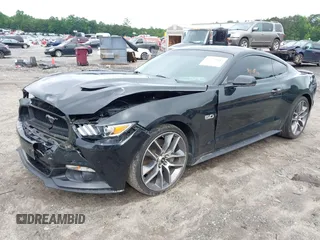 2015 Ford Mustang GT with VIN 1FA6P8CF2F5423037, listed as a IAAI auction lot 42370882 with 149,794 mi miles and . Bid and sale history available at DreamBid. Image 2.