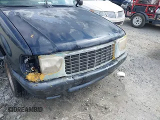 1999 Mercury Mountaineer z VIN 4M2DU52P3XUJ37055, wystawiony jako IAAI lot #41940577 z przebiegiem 218 702 mil mil oraz . Historia ofert i sprzedaży dostępna na DreamBid. Obrazek 12.