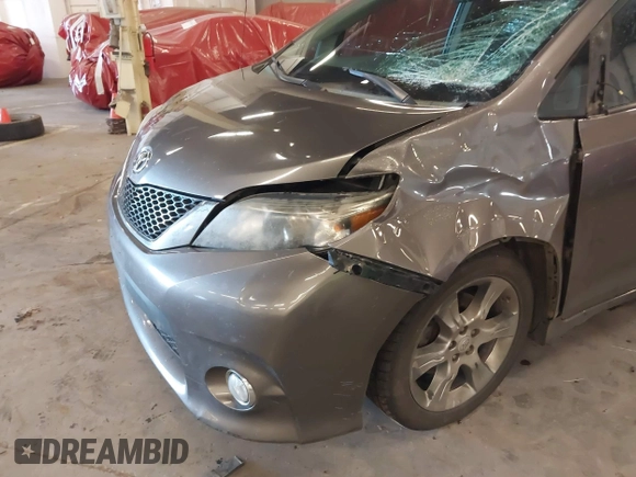 2011 Toyota Sienna SE with VIN 5TDXK3DC7BS034516, listed as a IAAI auction lot 41539955 with 209,309 mi miles. Bid and sale history available at carsss.com. Image 17.