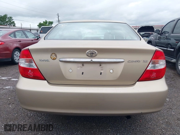 2002 Toyota Camry LE z VIN 4T1BE32K52U086150, wystawiony jako IAAI lot #42126685 z przebiegiem 175 212 mil mil oraz . Historia ofert i sprzedaży dostępna na DreamBid. Obrazek 16.