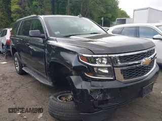 2017 Chevrolet Tahoe LT with VIN 1GNSKBKC3HR164976, listed as a IAAI auction lot 42263818 with 99,261 mi miles and . Bid and sale history available at DreamBid. Image 1.