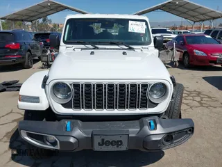 2024 Jeep Wrangler Sahara with VIN 1C4RJXP61RW126904, listed as a IAAI auction lot 41998215 with 32,034 mi miles and . Bid and sale history available at DreamBid. Image 12.