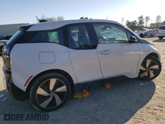 2015 BMW i3 with VIN WBY1Z4C52FV502978, listed as a Copart auction lot 44496093 with 59,588 mi miles. Bid and sale history available at carsss.com. Image 3.