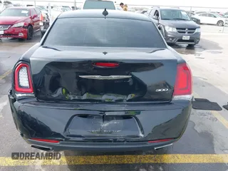 2015 Chrysler 300 with VIN 2C3CCABG7FH894124, listed as a IAAI auction lot 41318188 with 196,246 mi miles. Bid and sale history available at carsss.com. Image 16.