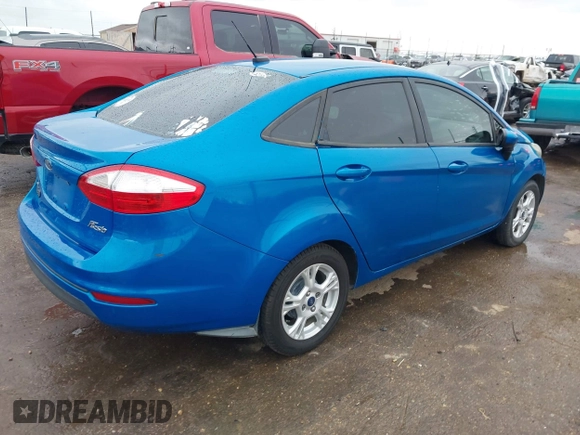2016 Ford Fiesta SE with VIN 3FADP4BJXGM156859, listed as a IAAI auction lot 42119154 with 74,157 mi miles and . Bid and sale history available at DreamBid. Image 4.