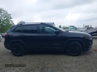 2021 Jeep Cherokee Latitude with VIN 1C4PJLCB9MD125782, listed as a IAAI auction lot 42251788 with 89,534 mi miles and . Bid and sale history available at DreamBid. Image 13.