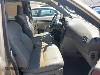 2001 Chrysler Town & Country Limited with VIN 2C8GP64L31R241168, listed as a IAAI auction lot 42094315 with 213,800 mi miles. Bid and sale history available at carsss.com. Image 5.