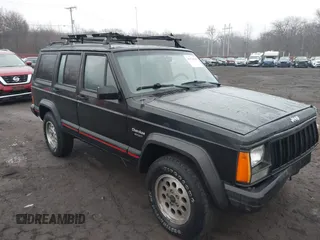 1995 Jeep Cherokee Sport with VIN 1J4FJ68S7SL572730, listed as a IAAI auction lot 41474520 with 189,907 mi miles. Bid and sale history available at carsss.com. Image 18.
