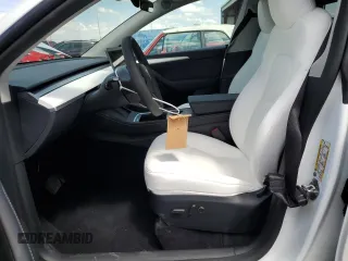 2025 Tesla Model Y Long Range with VIN 7SAYGDED4SF232433, listed as a Copart auction lot 51504015 with Not Provided miles and Salvage Title. Bid and sale history available at DreamBid. Image 7.