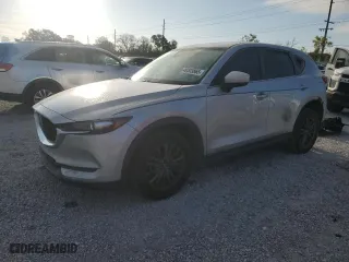 2020 Mazda CX-5 Touring with VIN JM3KFACM8L0764878, listed as a Copart auction lot 49303865 with 114,890 mi miles and Salvage Title. Bid and sale history available at carsss.com. Image 1.