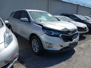 2019 Chevrolet Equinox LT z VIN 3GNAXKEV7KS663049, wystawiony jako IAAI lot #41827817 z przebiegiem 127 076 mil mil oraz . Historia ofert i sprzedaży dostępna na DreamBid. Obrazek 1.
