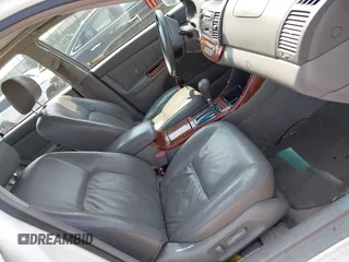 2002 Toyota Camry XLE z VIN 4T1BF30K22U007310, wystawiony jako IAAI lot #42419765 z przebiegiem 206 050 mil mil oraz . Historia ofert i sprzedaży dostępna na DreamBid. Obrazek 5.