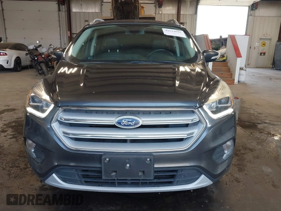2019 Ford Escape Titanium with VIN 1FMCU9J97KUC55772, listed as a IAAI auction lot 42514001 with 77,737 mi miles and . Bid and sale history available at DreamBid. Image 13.