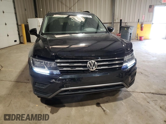 2021 Volkswagen Tiguan SE with VIN 3VV2B7AXXMM071024, listed as a Copart auction lot 52243675 with 31,448 mi miles and Salvage Title. Bid and sale history available at DreamBid. Image 5.